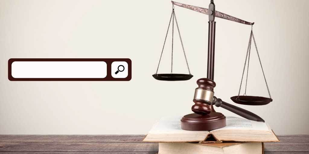 Website search bar next to a traditional legal scale