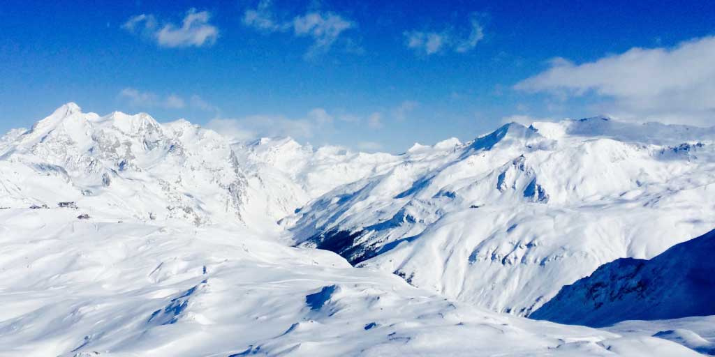 peaks of a snow covered mountains